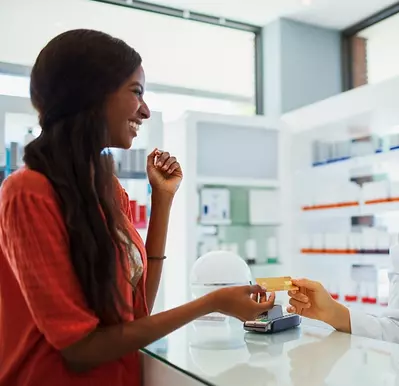 smiling woman at pharmacy