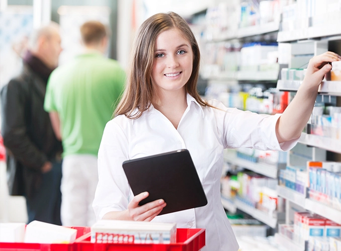 pharmacist with tablet