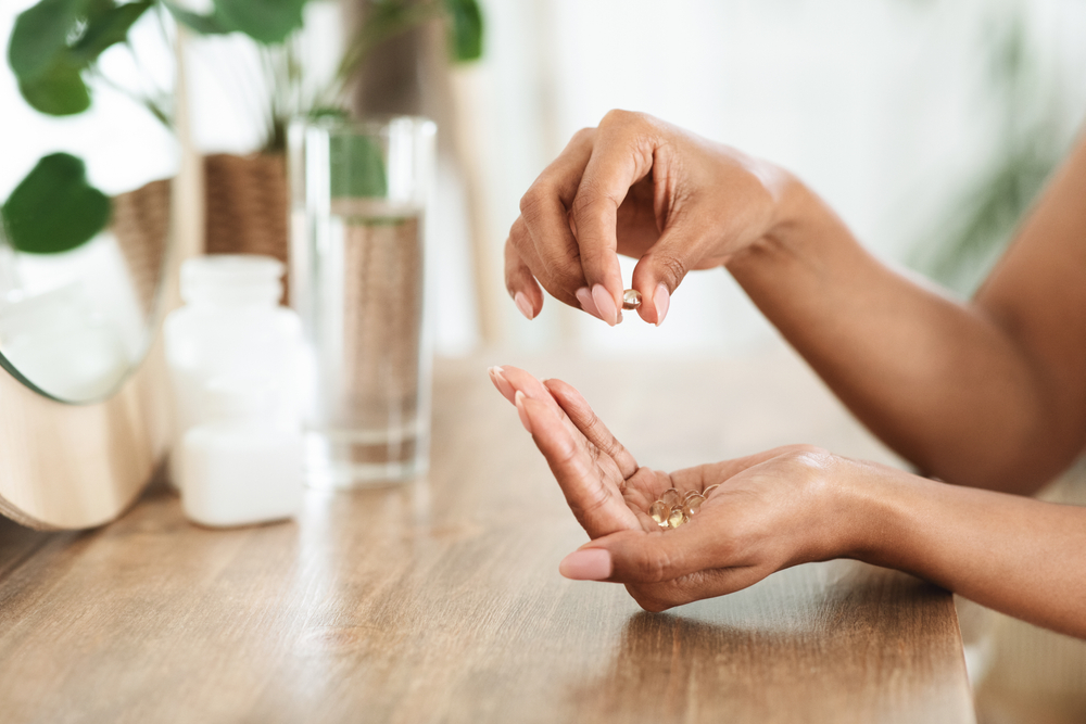 woman taking vitamins