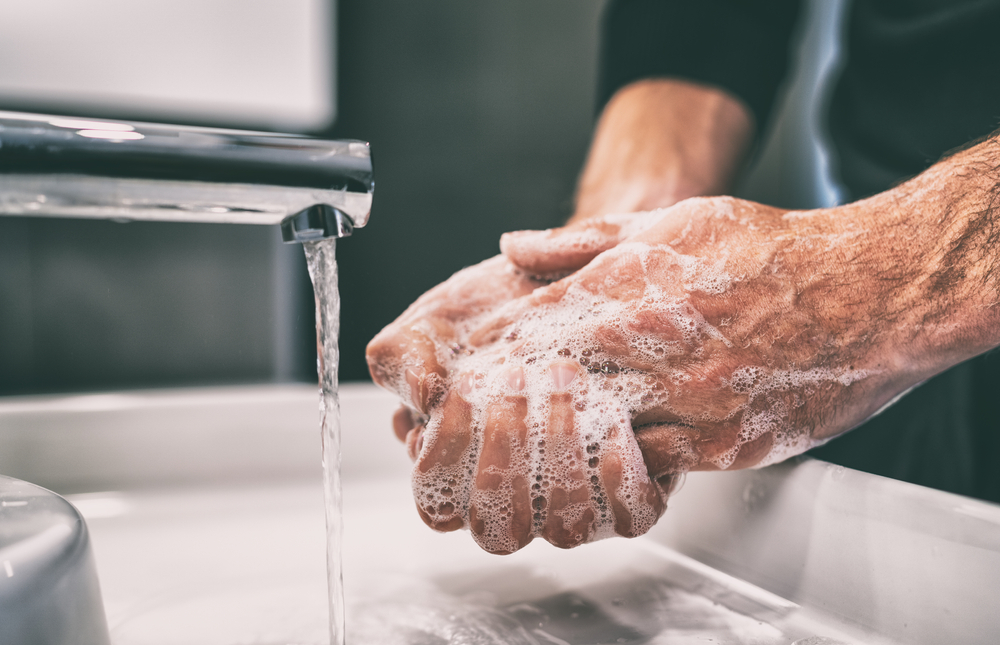 man washing hands